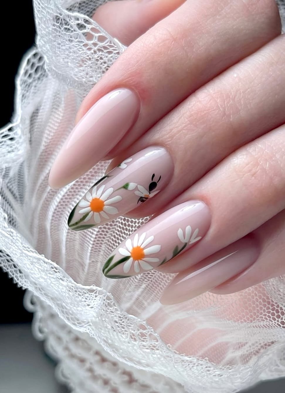 Soft pink base and hand-painted daisies