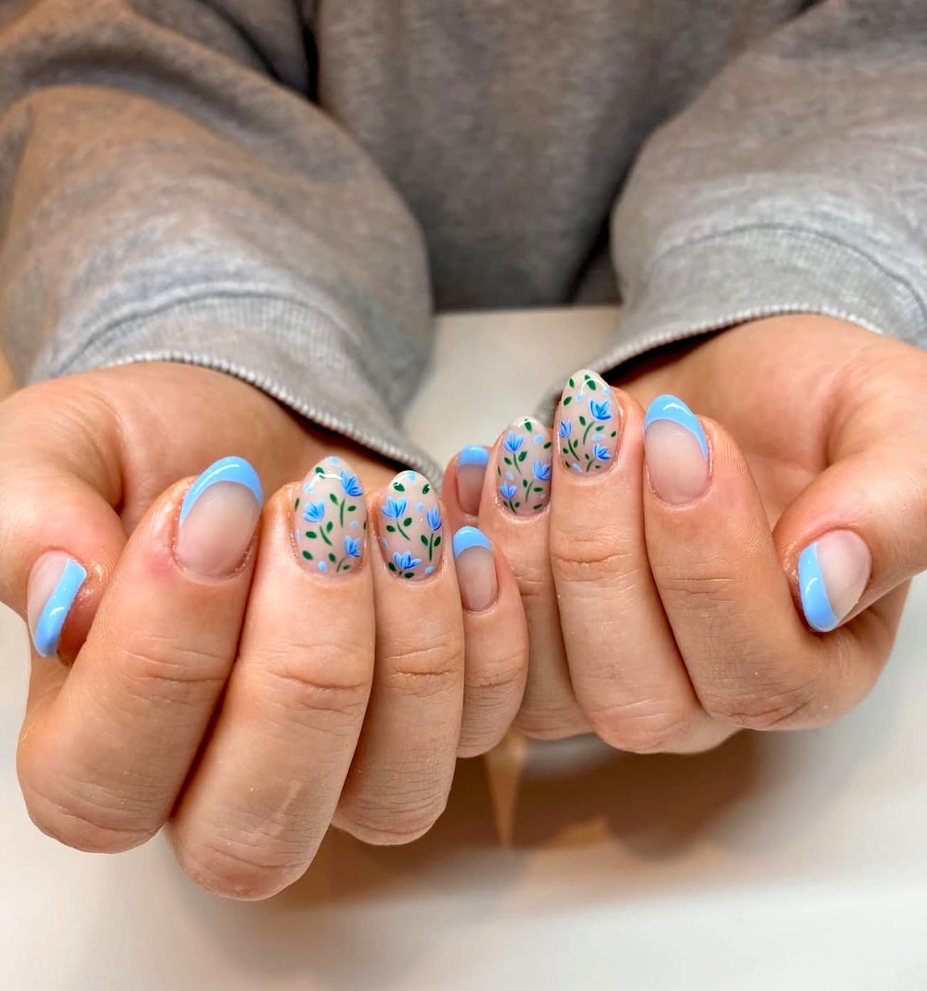 Hand-painted blue tulips: Spring Nail Art