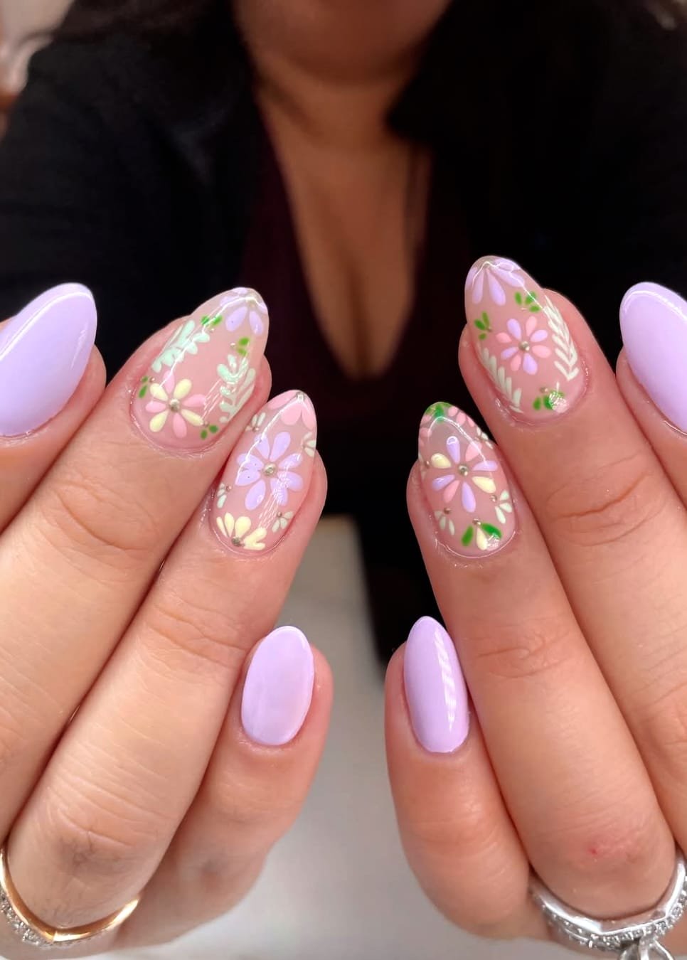 Lavender nails with delicate floral designs